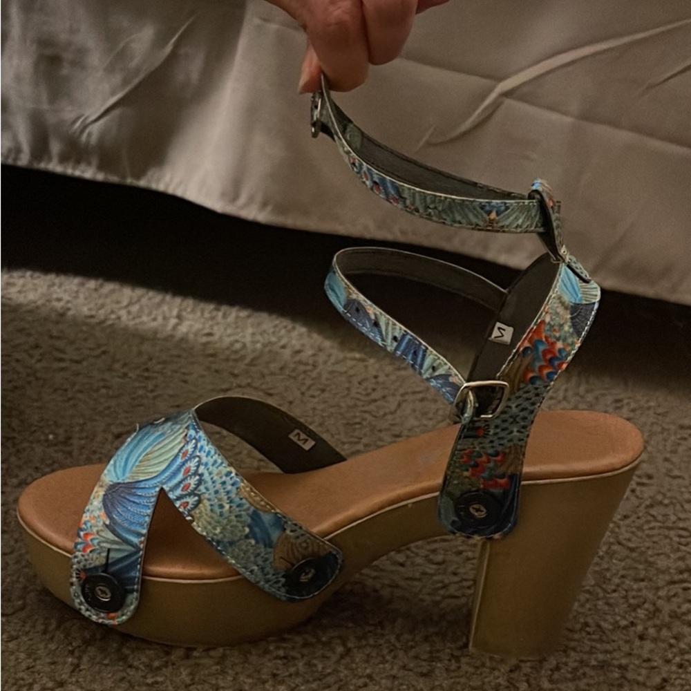 Swappable straps and sandal/wedges. These sandals have changeable straps